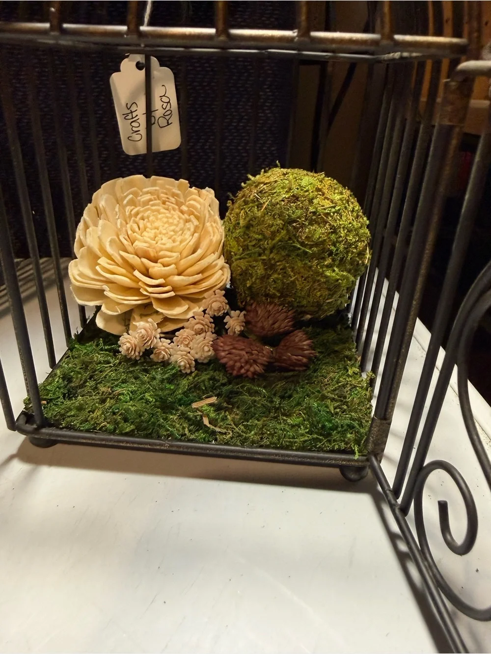 Decorative Black Metal Birdcage with Natural Moss and Wood Flower Accent